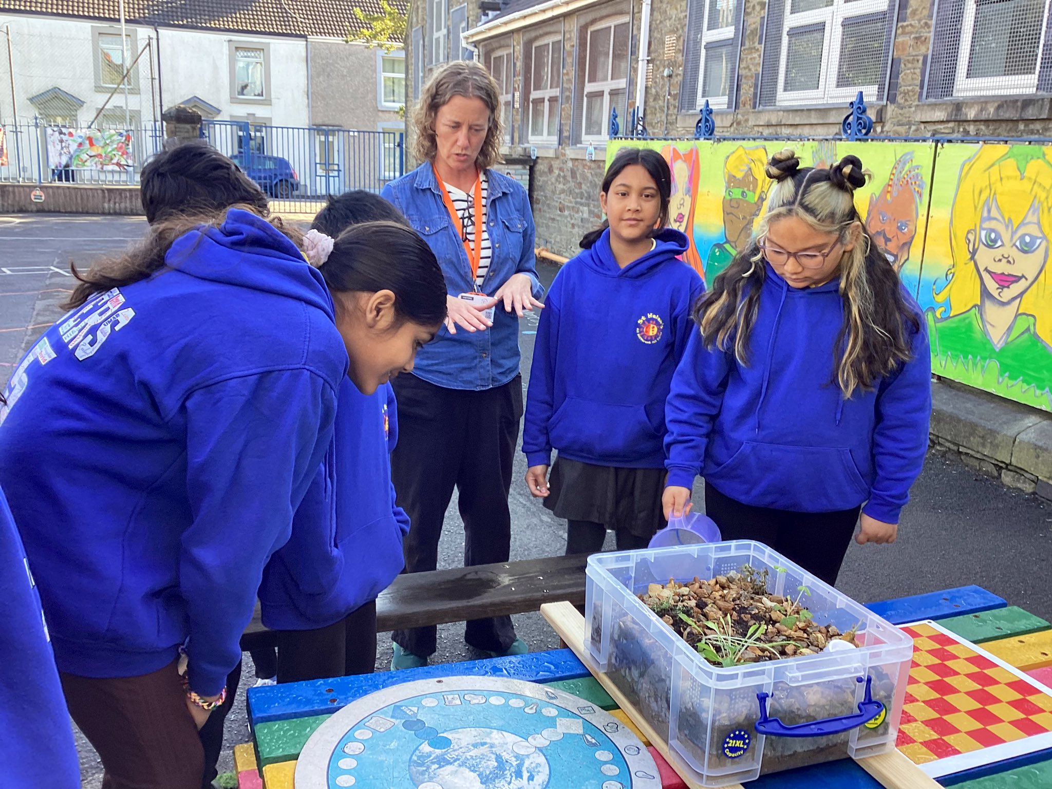 school children learning about regeneration